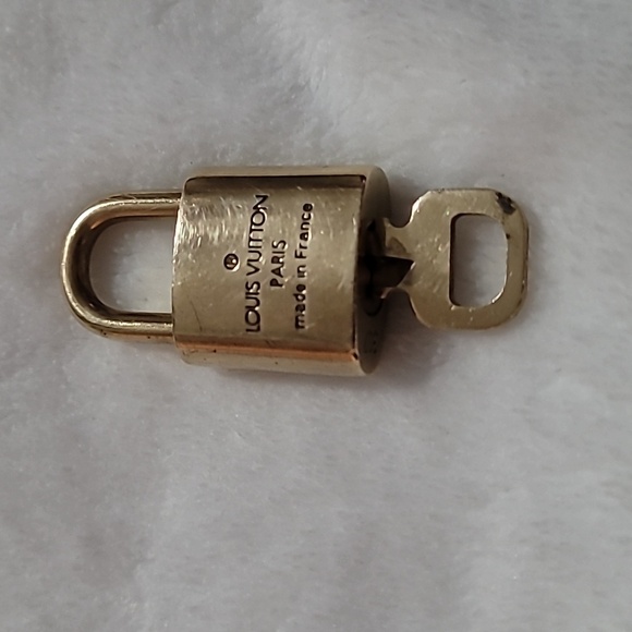 Authentic Louis Vuitton Lock and Key set - Picture 2 of 3